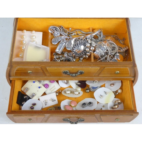 76 - A wooden jewellery box with a lot of assorted costume jewellery, earrings etc.