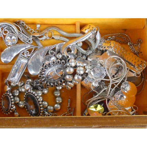 76 - A wooden jewellery box with a lot of assorted costume jewellery, earrings etc.