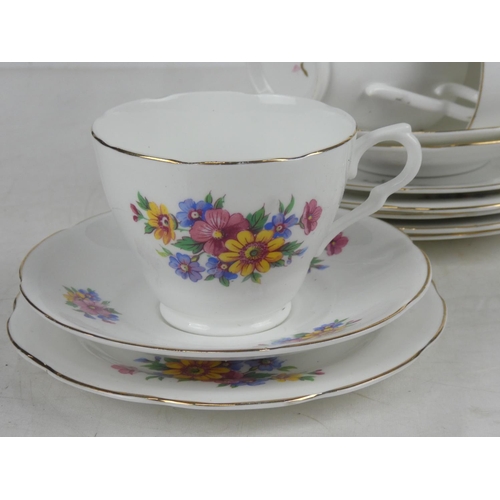 85 - A part floral patterned tea set.