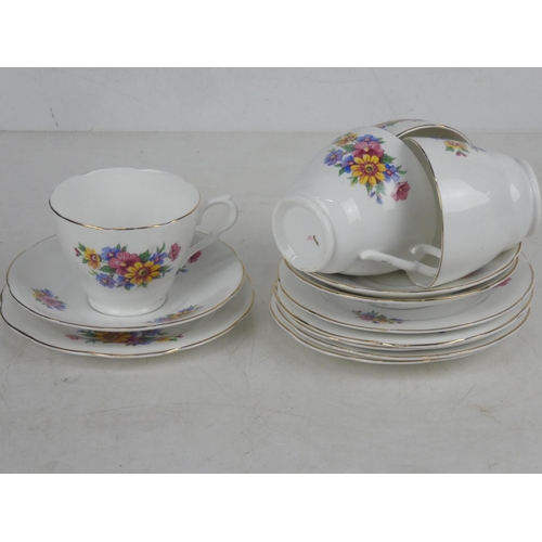 85 - A part floral patterned tea set.