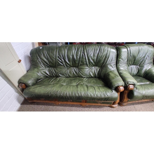 54 - A three piece green leather suite.