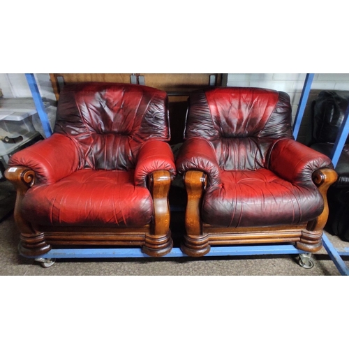 55 - A three piece ox blood leather suite