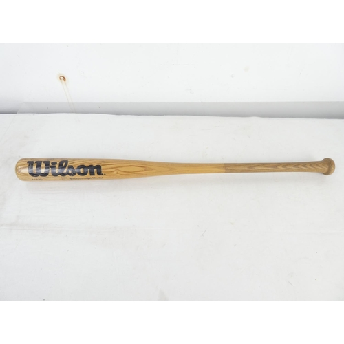 2 - A Wilson A1435 wooden baseball bat.