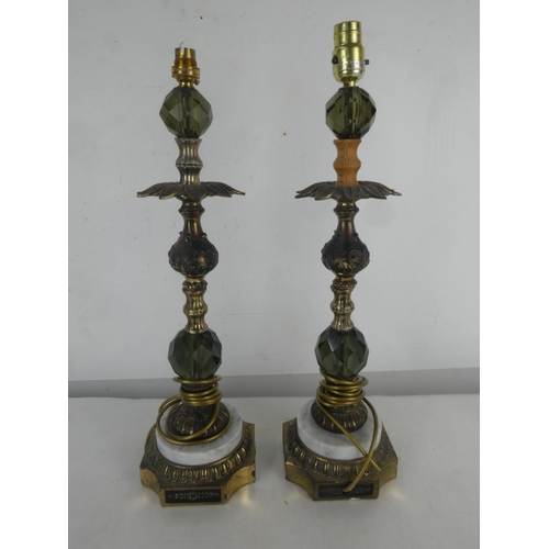 22 - A pair of heavy brass and marble table lamps, measuring 23