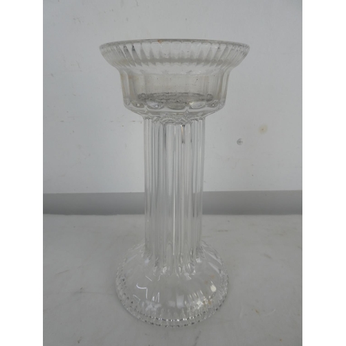 62 - A stunning glass pedestal candleholder, measuring 25cm.