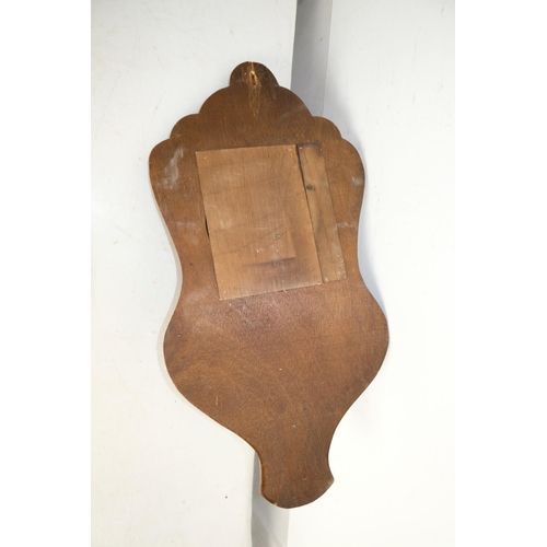 304 - A vintage oak wall bracket with mirror.