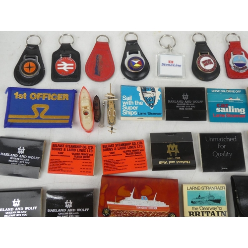 116 - A collection of vintage matchboxes and keyrings to include London, Sealink, British Rail and more.