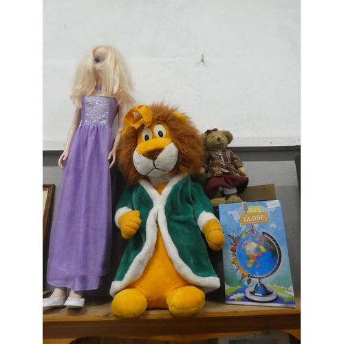 139 - A boxed Junior globe of the world, a large stuffed toy of a lion, a large floor standing toy doll me... 