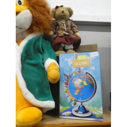 139 - A boxed Junior globe of the world, a large stuffed toy of a lion, a large floor standing toy doll me... 