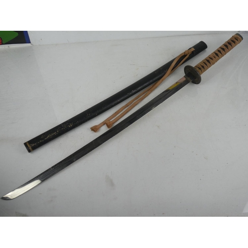 140 - A replica Samurai sword.