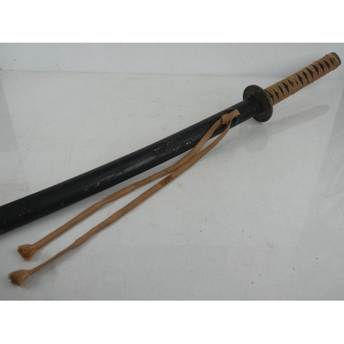 140 - A replica Samurai sword.