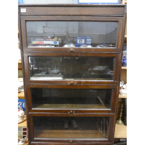 142 - A stunning vintage 6 tier stacking barrister bookcase.