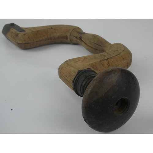 151 - An antique wood carpenters brace/ drill.