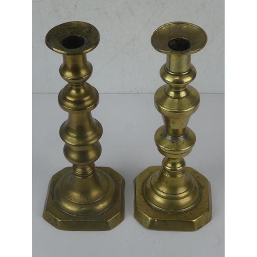 179 - 2 vintage brass candlesticks.  Measuring approx 28cm in height.