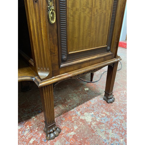 328 - A stunning Irish Georgian style mahogany sideboard on eight claw and ball feet, each foot supported ... 