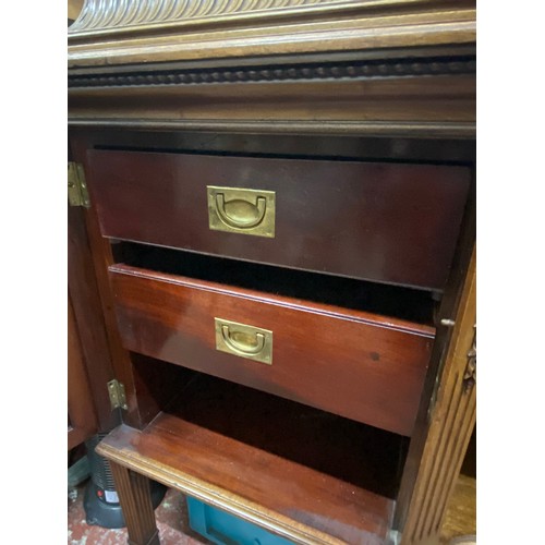 328 - A stunning Irish Georgian style mahogany sideboard on eight claw and ball feet, each foot supported ... 