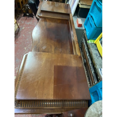 328 - A stunning Irish Georgian style mahogany sideboard on eight claw and ball feet, each foot supported ... 