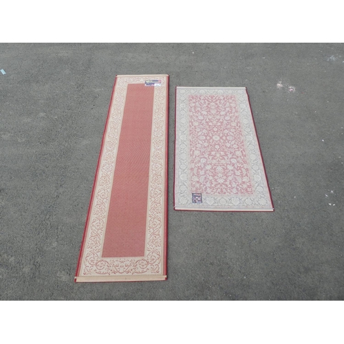 207 - 2 decorative rugs.