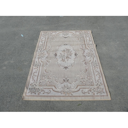 210 - A large decorative rug.