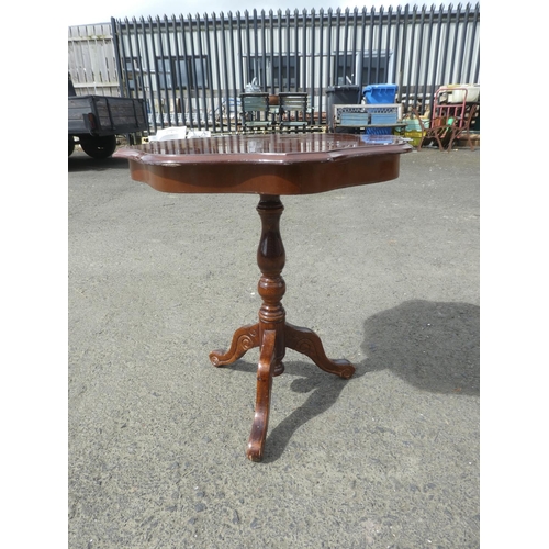 226 - A lamp/ occasional table on tripod base with inlaid design.