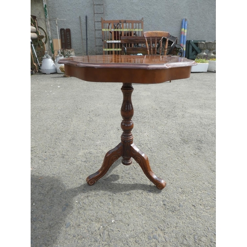 226 - A lamp/ occasional table on tripod base with inlaid design.