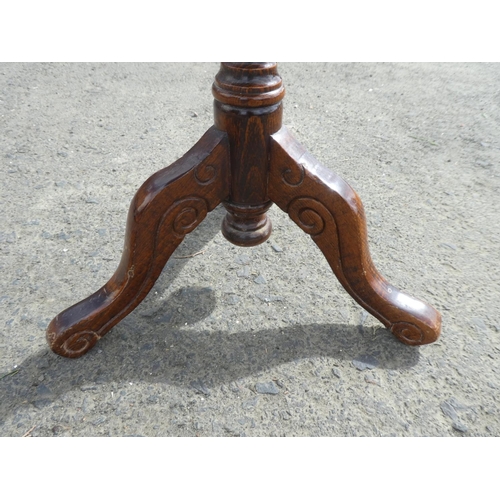 226 - A lamp/ occasional table on tripod base with inlaid design.