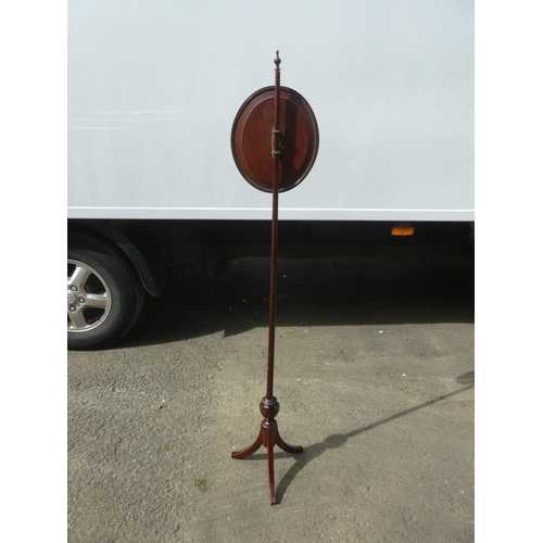 227 - An antique pole fire screen on tripod base.  Measuring approx 140cm in height.