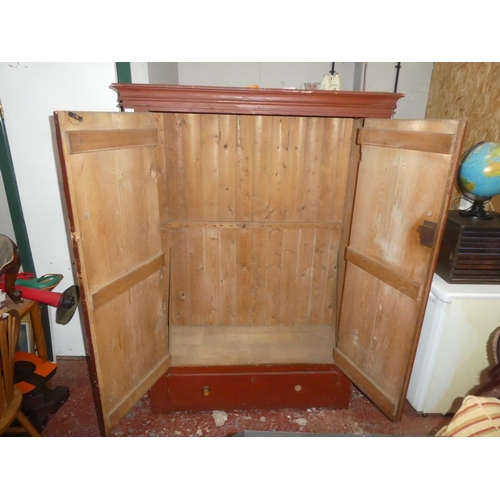 246 - An antique Irish Vernacular pine two door wardrobe/ cabinet.  Measuring approx 183x128x48cm.