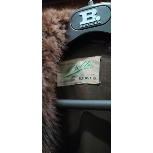 250 - A vintage fur coat with label M Soble, Direct Furriers, Belfast.