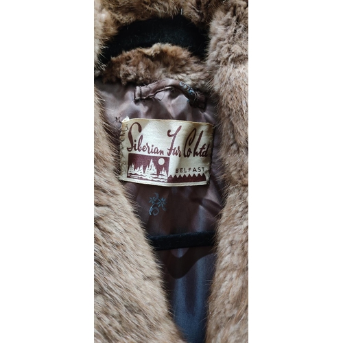 254 - A vintage fur coat with label Siberian Fur Co Ltd, Belfast.