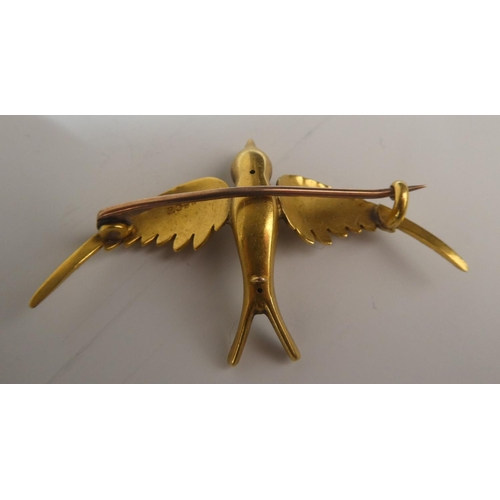 273 - A stunning 15ct gold brooch, modelled as a bird. Total weight 4.4g