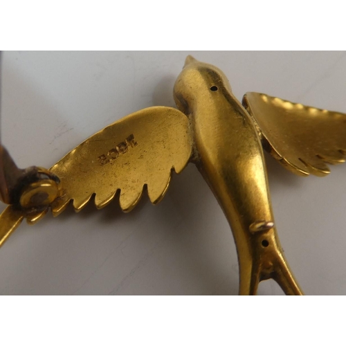 273 - A stunning 15ct gold brooch, modelled as a bird. Total weight 4.4g