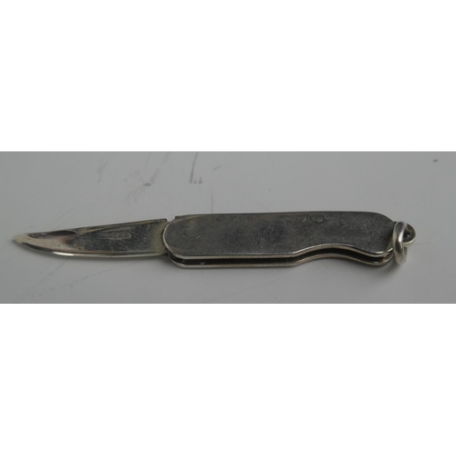 276 - A Sterling silver miniature fruit knife.