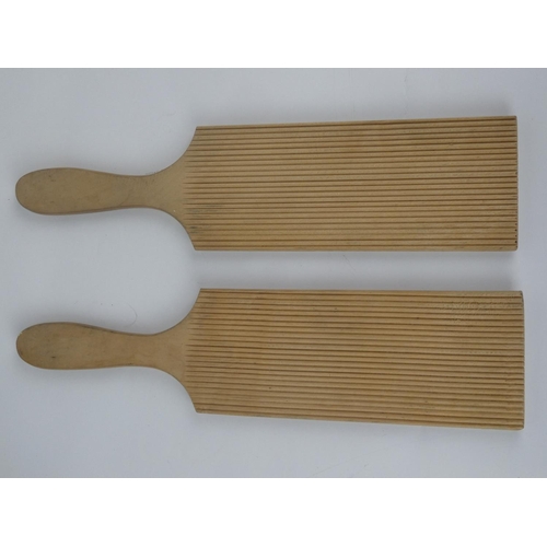 292 - A pair of vintage wooden butter pats.