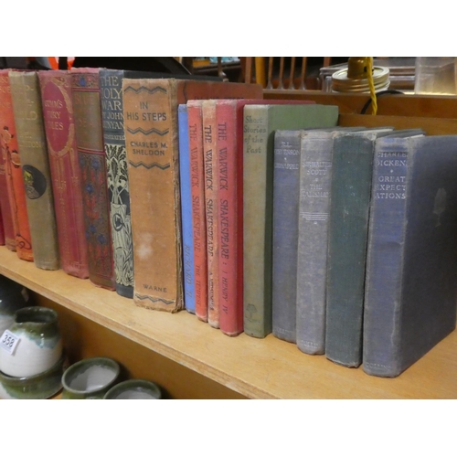 357 - A collection of vintage books to include The Holy War, Robinson Crusoe and more.