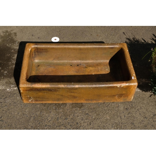 428 - A stoneware trough planter.