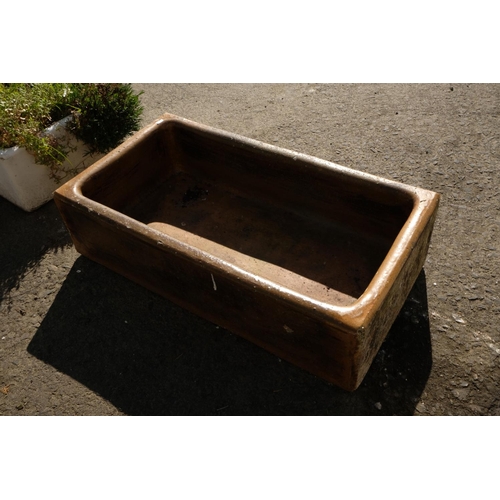 428 - A stoneware trough planter.