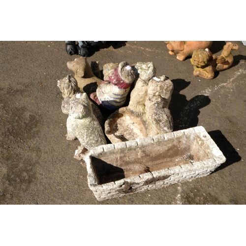 430 - A large assortment of concrete planters, statues and more.