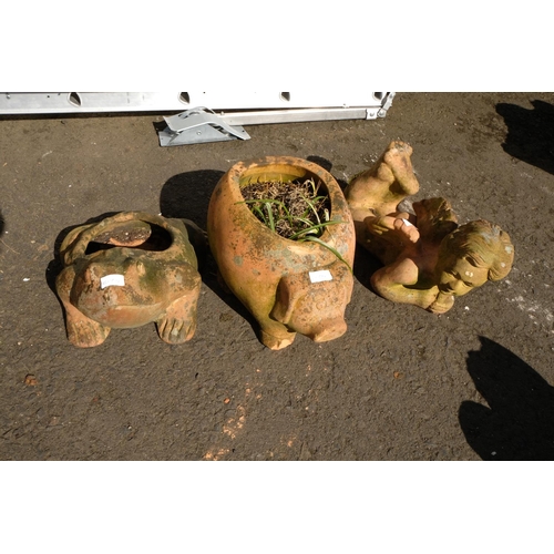 431 - Three terracotta animal planters.