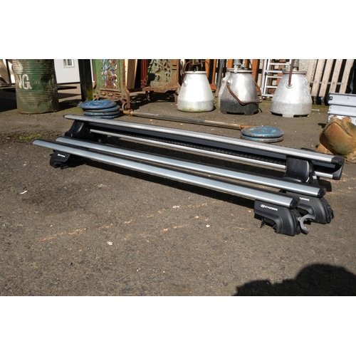 435 - Two sets of Thule car roof racks and attachments.