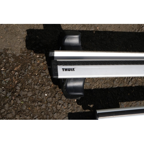 435 - Two sets of Thule car roof racks and attachments.