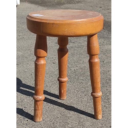 378 - A pine milking stool.