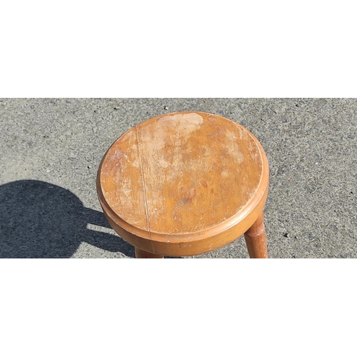 378 - A pine milking stool.