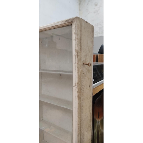 384 - A vintage display cabinet, measuring 15