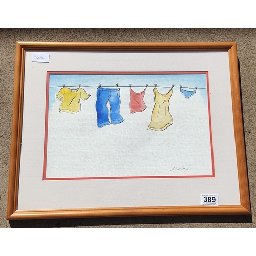 389 - A framed 'Wash Day' watercolour, measuring 52cm x 40cm signed.