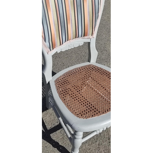 393 - An upcycled rattan seat occasional chair.