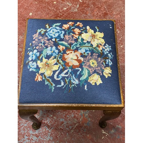 397 - An upholstered stool with tapestry panel.