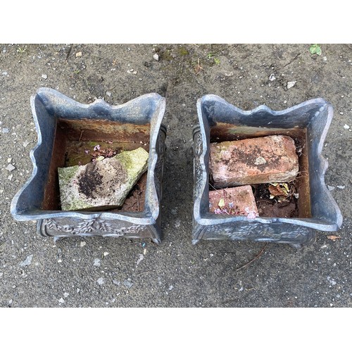 330 - A stunning pair of cast iron planters.