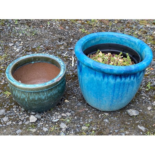 331 - Two glazed plant pots.