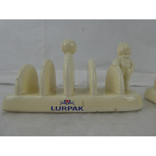 12 - A pair of Lurpak ceramic toast racks.